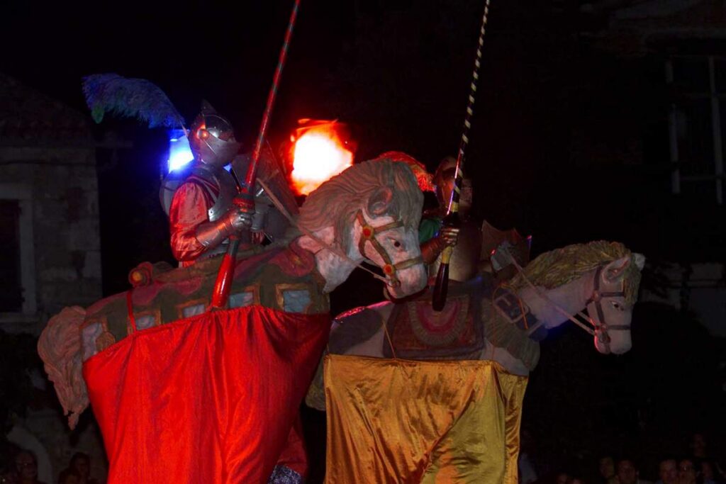 Trampolinists with horses and armour